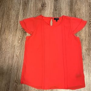 The limited womens top in bold pink or coral color